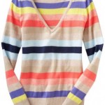 a striped sweater on a swinger