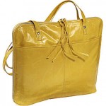 a yellow leather bag with a bow