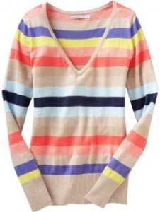 a long sleeved sweater with multicolored stripes