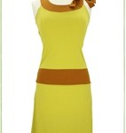 a yellow and brown dress on a mannequin