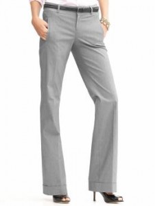 a woman wearing grey pants