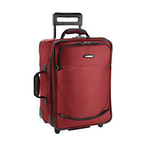 a red suitcase with black handles