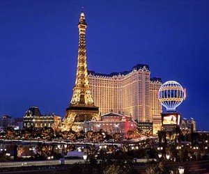 a large building with Paris Las Vegas in the background