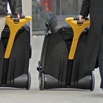 a couple of people carrying luggage