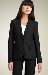 a woman in a black suit