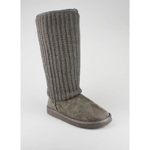 a grey boot with a knitted sock