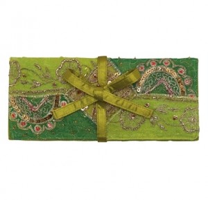 a green fabric with a bow