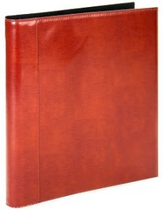 a close-up of a red leather book