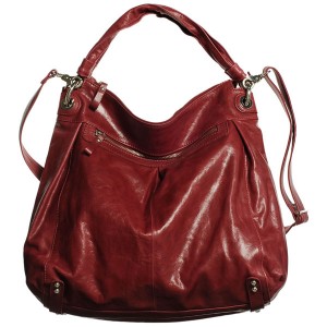 a red leather purse with strap
