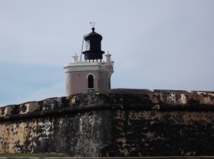 a lighthouse on a stone wall