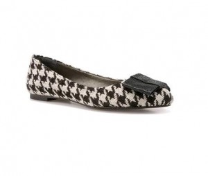 a black and white flat shoe