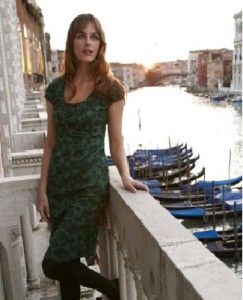 a woman leaning on a railing