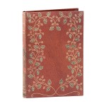 a brown book with a floral design