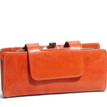 an orange purse with a clip