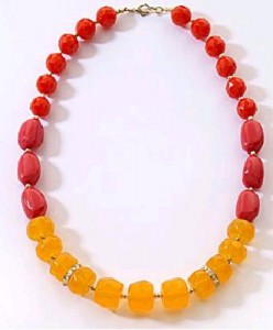 a necklace with red and yellow beads