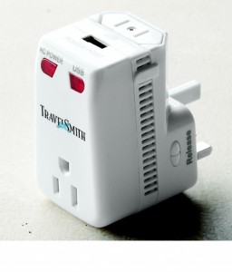 a close-up of a travel adapter
