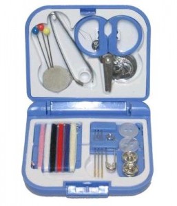a blue and white sewing kit
