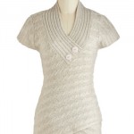 a white knitted dress on a mannequin