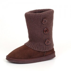 a brown boot with buttons on the top