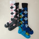 a group of socks on a white surface