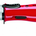 a red and black hair clipper