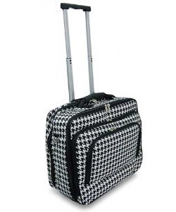 a black and white suitcase with handles