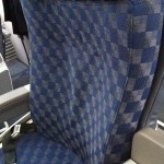 a blue and grey checkered seat