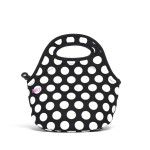 a black and white polka dot purse