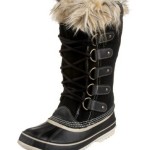 a black and white boot with fur