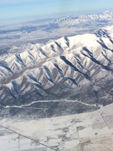 a aerial view of a snowy mountain range