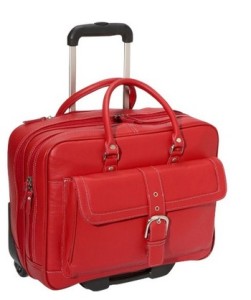 a red suitcase with handle