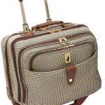 a brown and white checkered suitcase