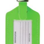 a green luggage tag with a white label