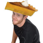 a man wearing a pie hat