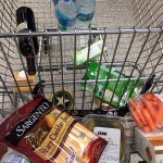 a shopping cart full of food