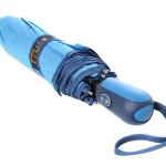 a blue umbrella with a strap