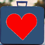 a blue suitcase with a heart on it
