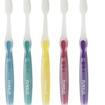 a group of toothbrushes in different colors