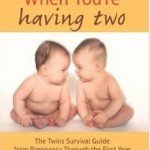 a book cover of two babies