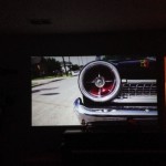 a screen showing a car on a television