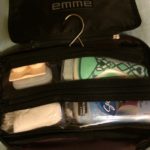 a bag with a hook and a toiletries inside