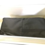 a black bag in a drawer