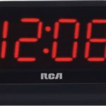 a black digital clock with red numbers