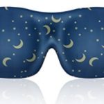 a blue mask with stars and moon designs