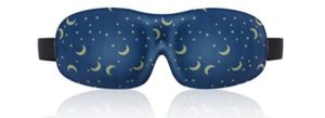 a blue mask with stars and moon designs