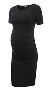 a pregnant woman wearing a black dress