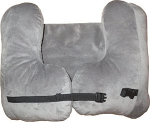 a grey pillow with a strap