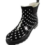 a black and white rain boot