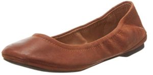 a brown shoe with a white background
